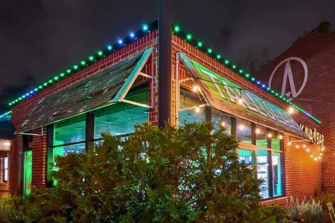 A Commercial Restraunt with green and blue Trimlight