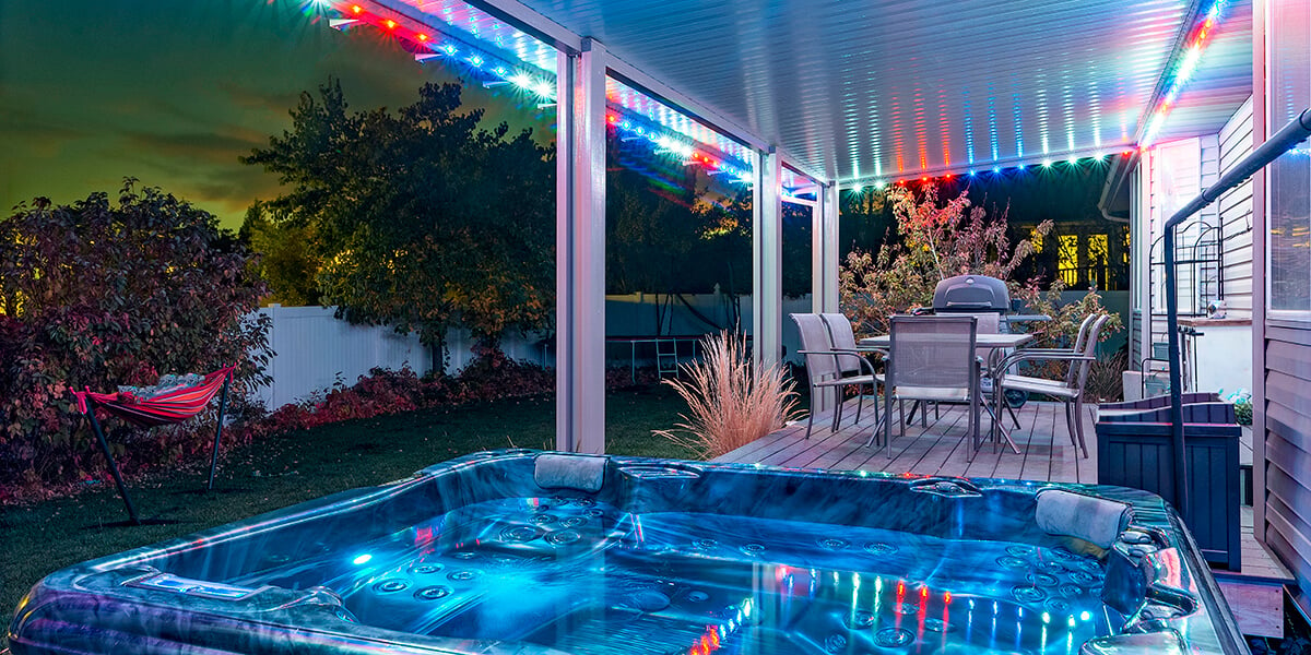 Fun Fourth of July festive red, white, & blue patio hot tub light array