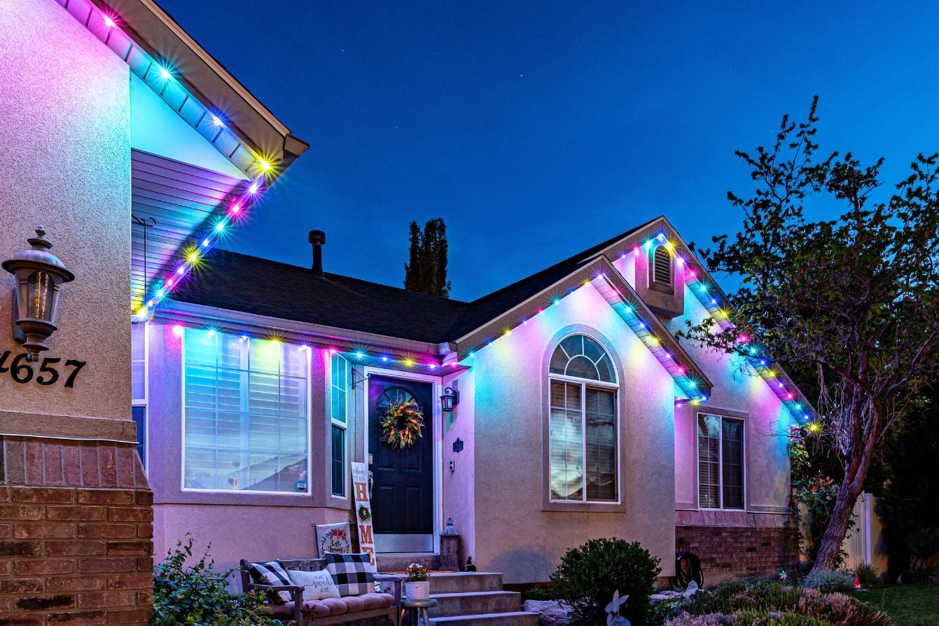 A modern home with Easter colored Trimlight lighting.