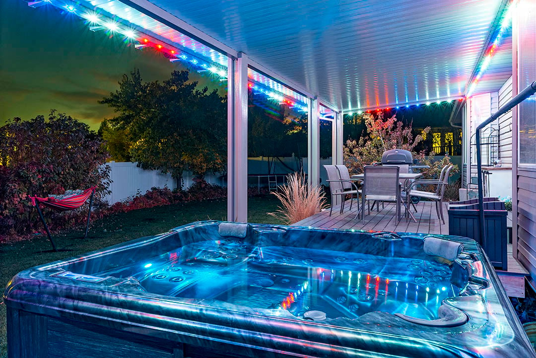 Red, white, and blue patio lighting over hot tub