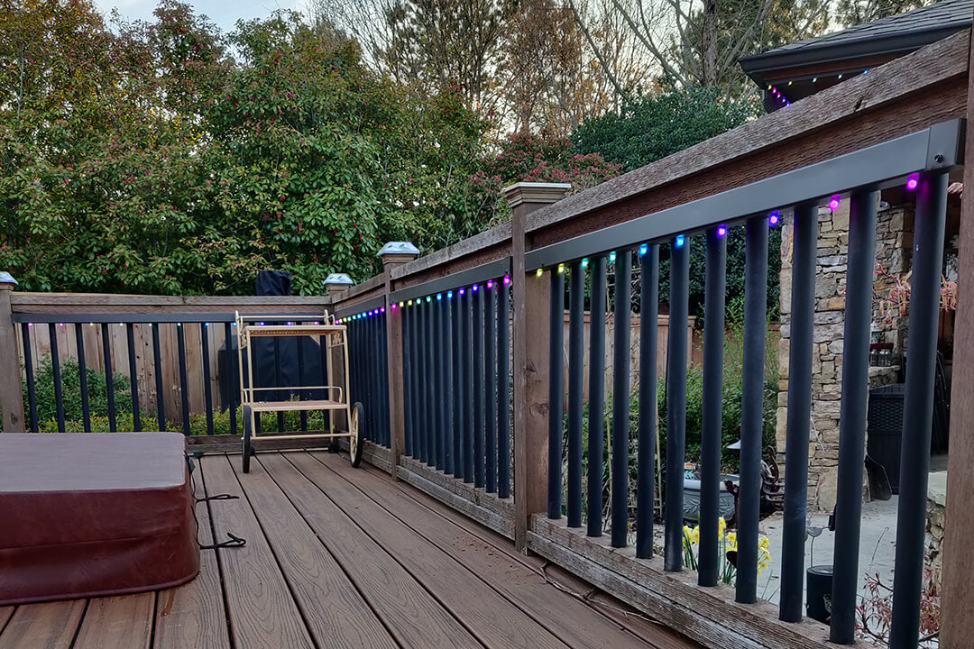 Colorful light pattern on backyard decck