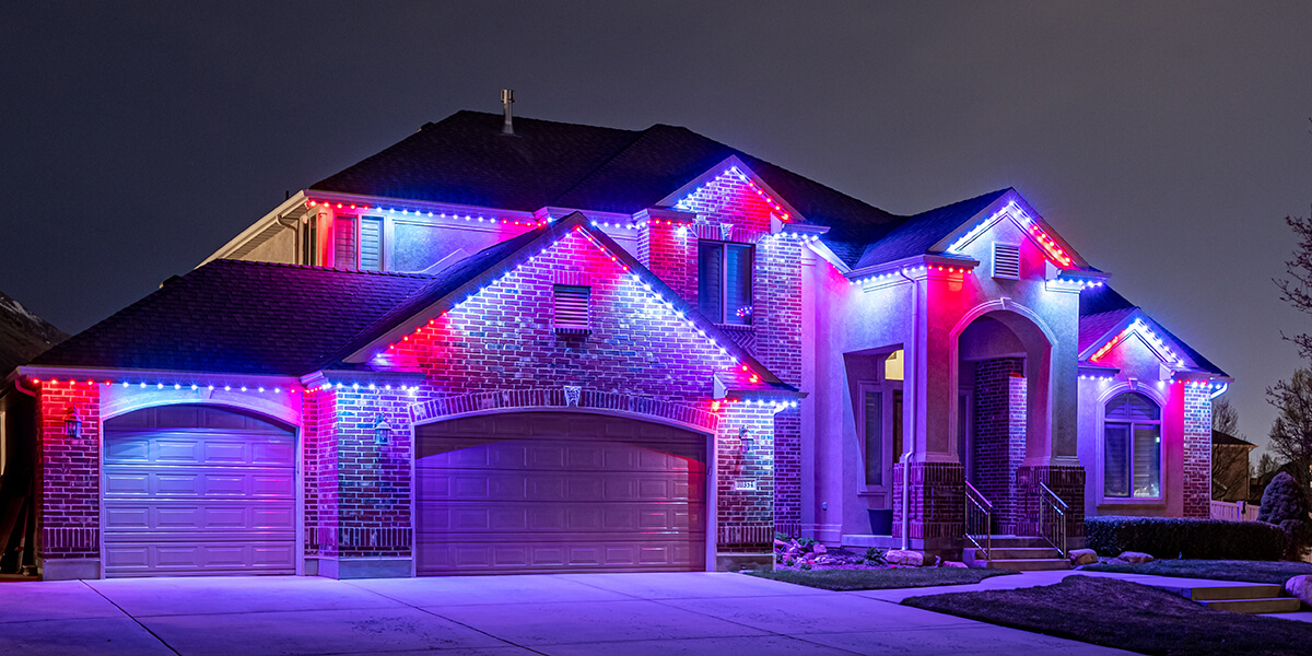 Colorful holiday themed light exterior on house